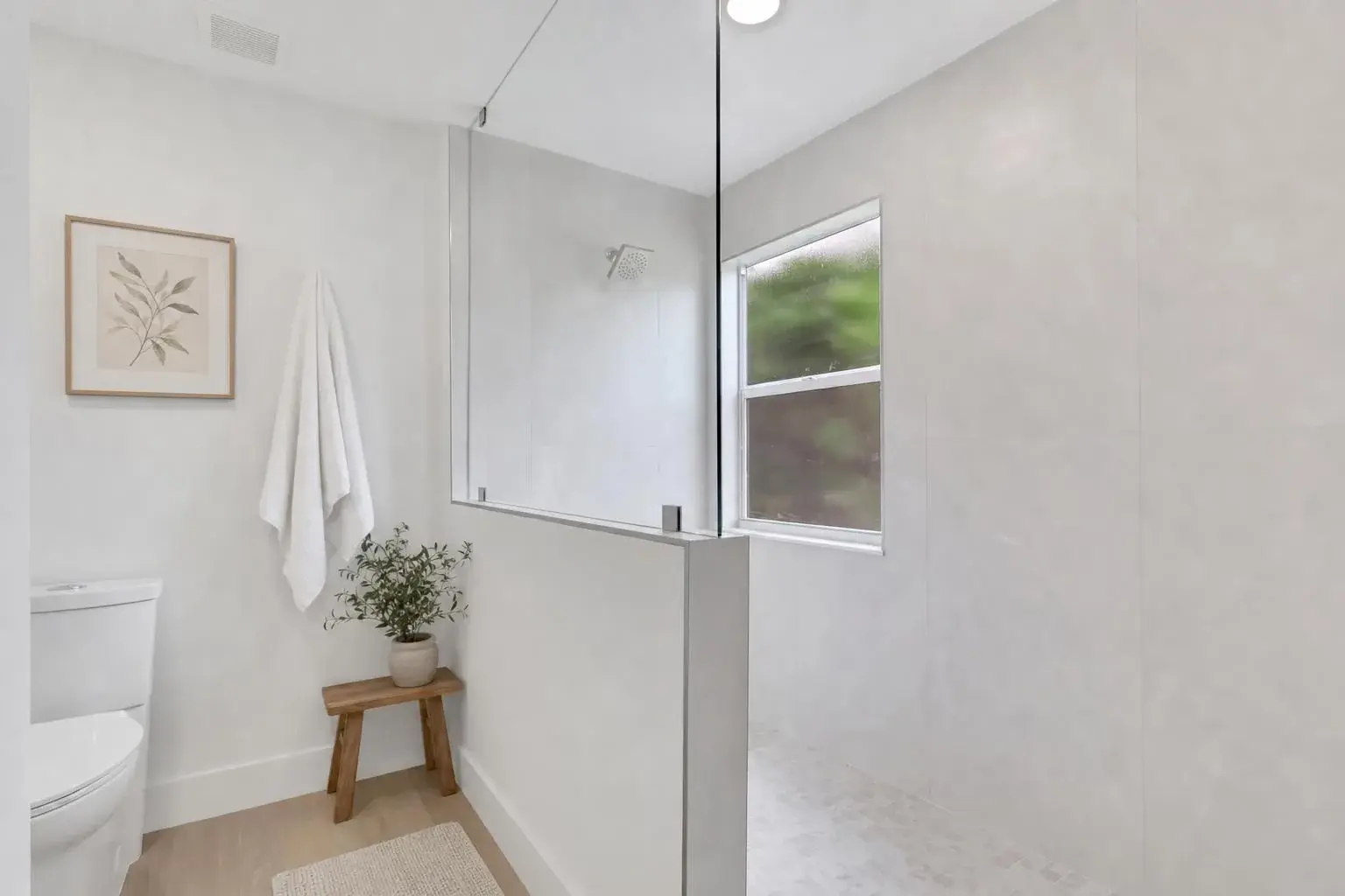 Curbless walk-in shower with large-format porcelain tile, Naples, Florida
