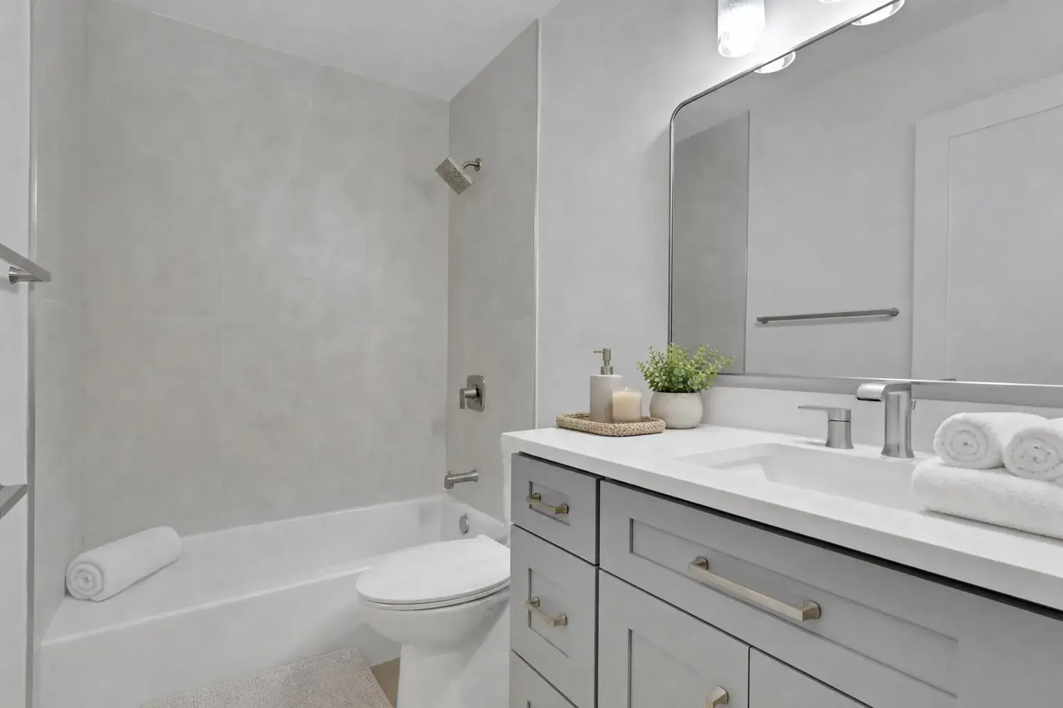 Renovated guest bathroom with tub surround, Naples, Florida